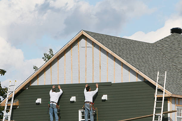 Professional Siding Installation technician working in Spring, TX